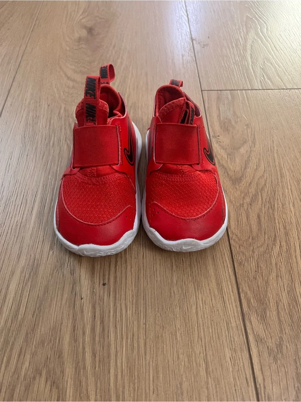 Nike Kids Red Slip-On Sneakers with Black Swoosh